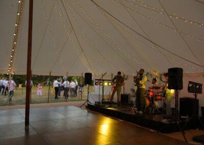 Band playing in traditional marquee