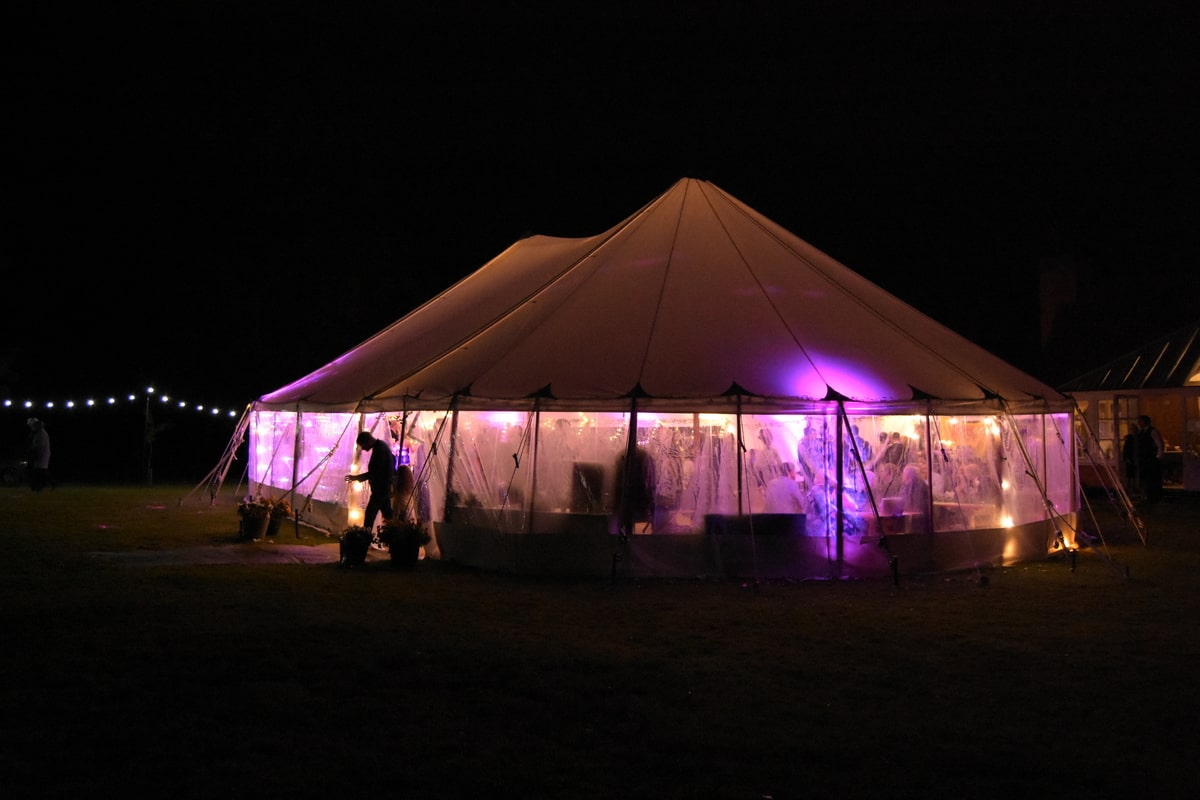 Night time exterior shot of a sail cloth marquee in Essex | County Marquees East Anglia