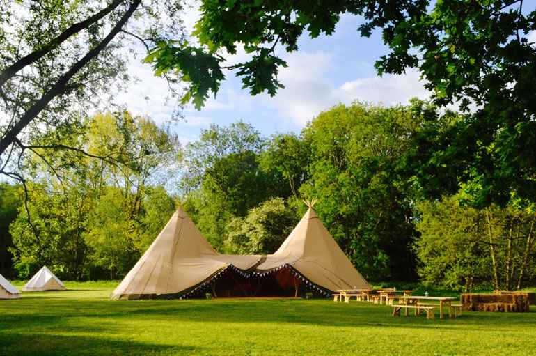 Distant view of a tipi hire in Essex | County Marquees East Anglia