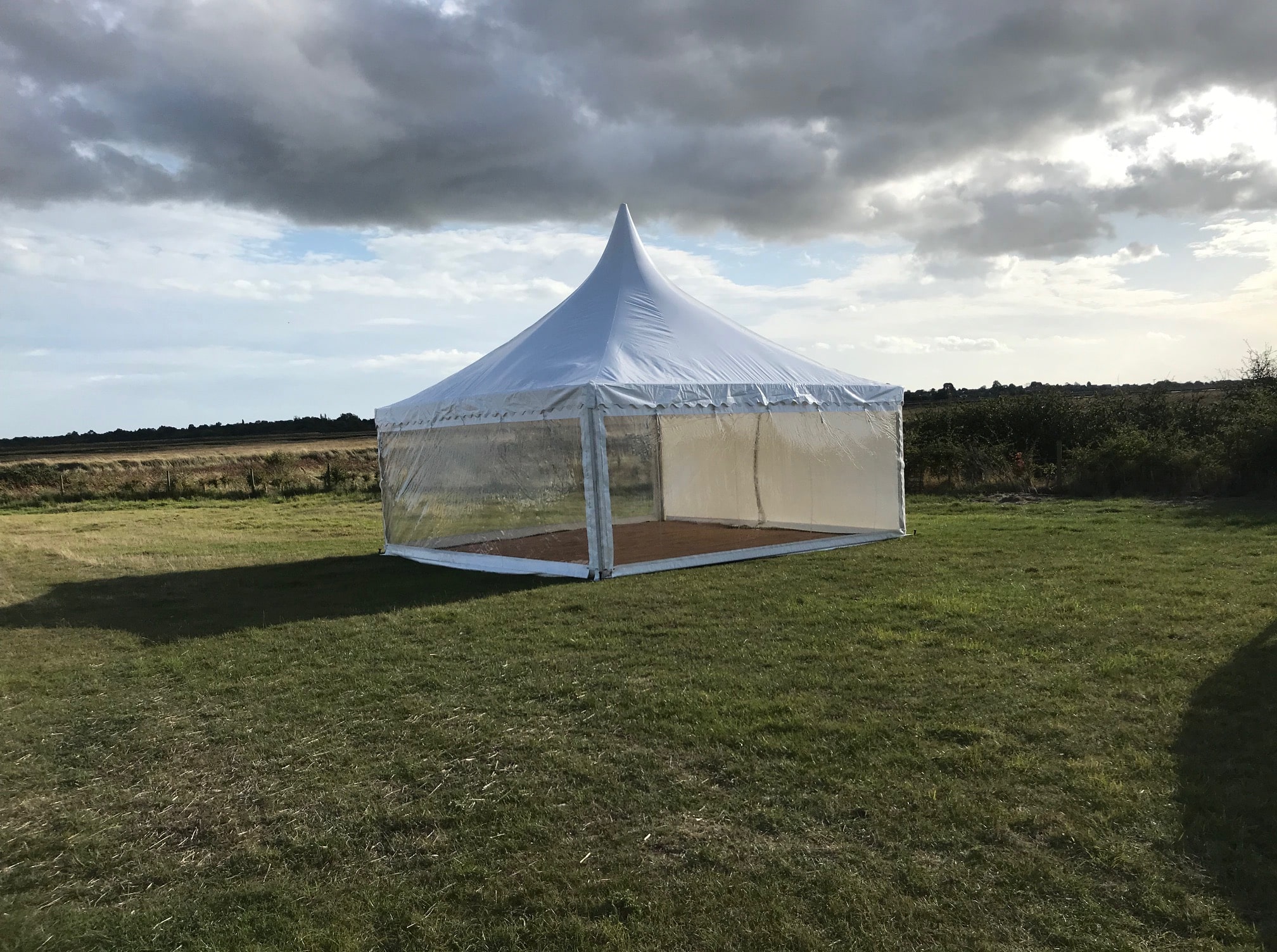 Canopies and pagodas, Chinese Hat marquee in farmers field