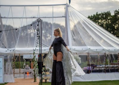 Stilt walker in front of Party Marquee hire for 40th birthday party in Essex by County Marquees East Anglia