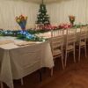 Christmas decorated tables in a traditional marquee