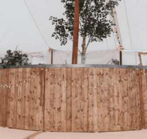 decorated full round rustic mobile bar