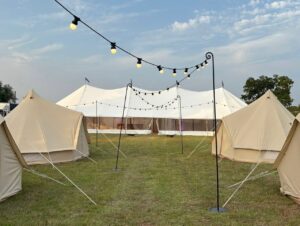 Elegant wedding marquee set up by professional marquee companies in Essex for a summer celebration