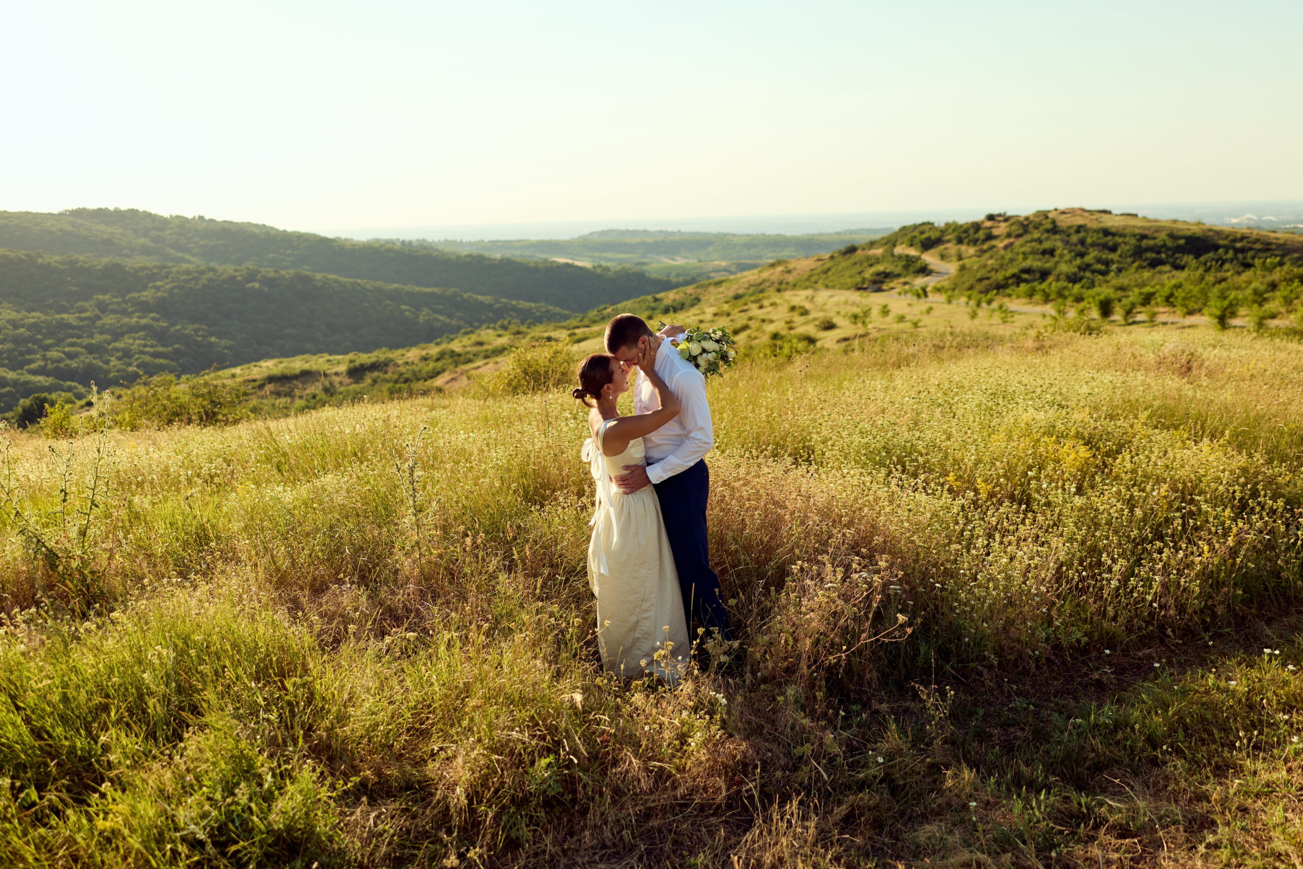 Outdoor marquee wedding reception in Essex featuring dance floor, festoon lighting and fire pits inspired by 2026 wedding trends
